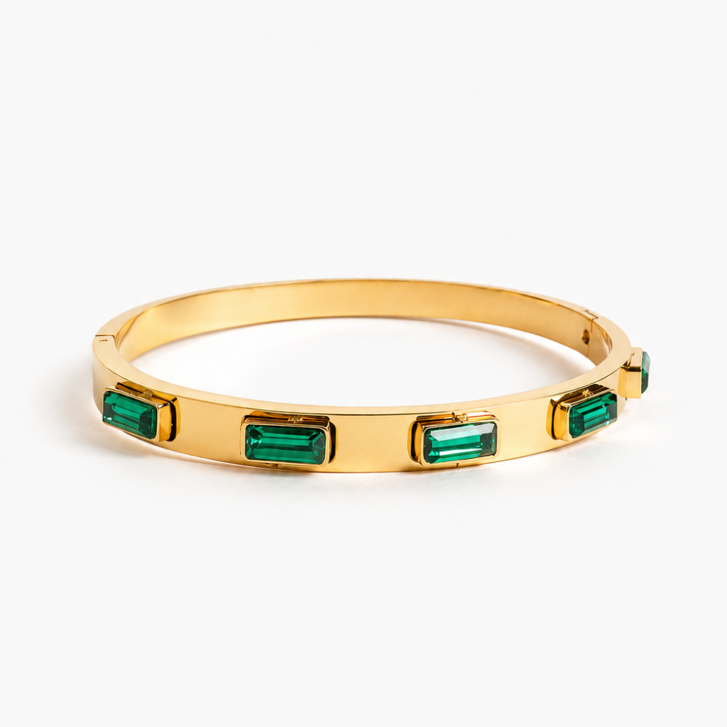 Pulseira Oren rígida em aço inoxidável 316L com banho de ouro 18k e zircónias integradas