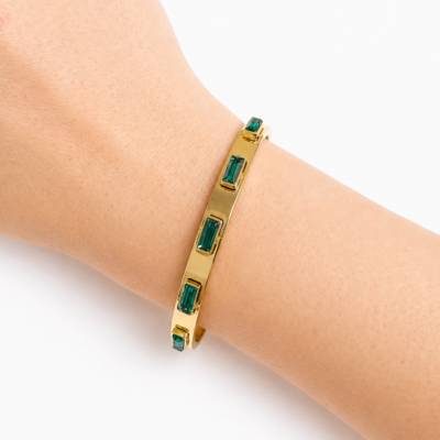 Pulseira Oren rígida em aço inoxidável 316L com banho de ouro 18k e zircónias integradas
