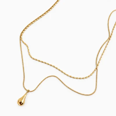 Colar Noma dourado em aço inoxidavel 316L